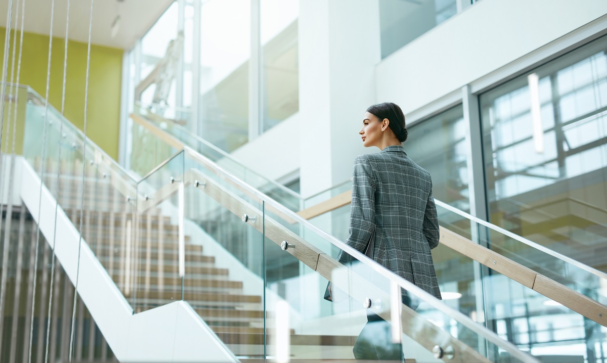 Woman going up the stairs