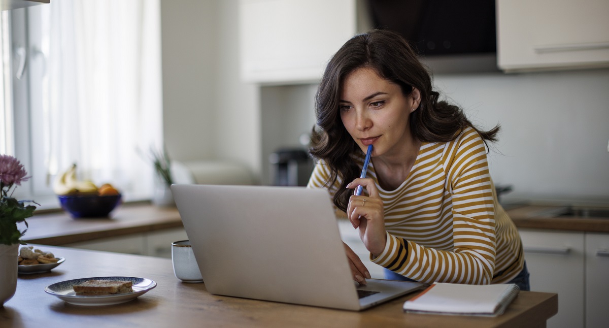 Woman looking at her laptop