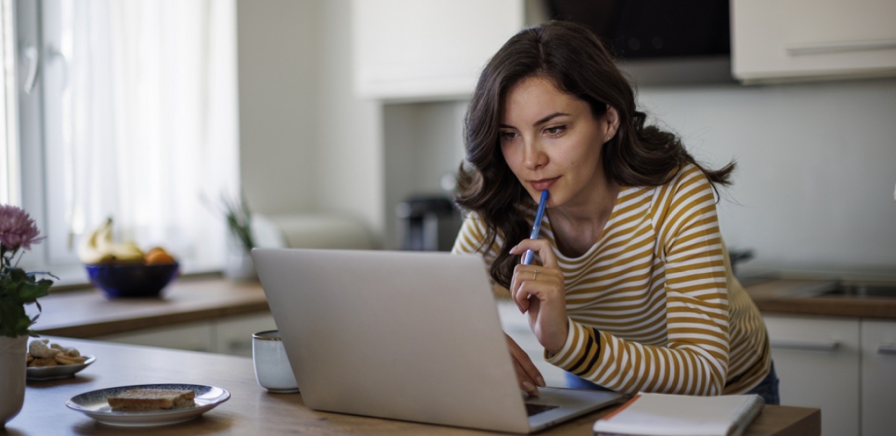 Woman looking at her laptop